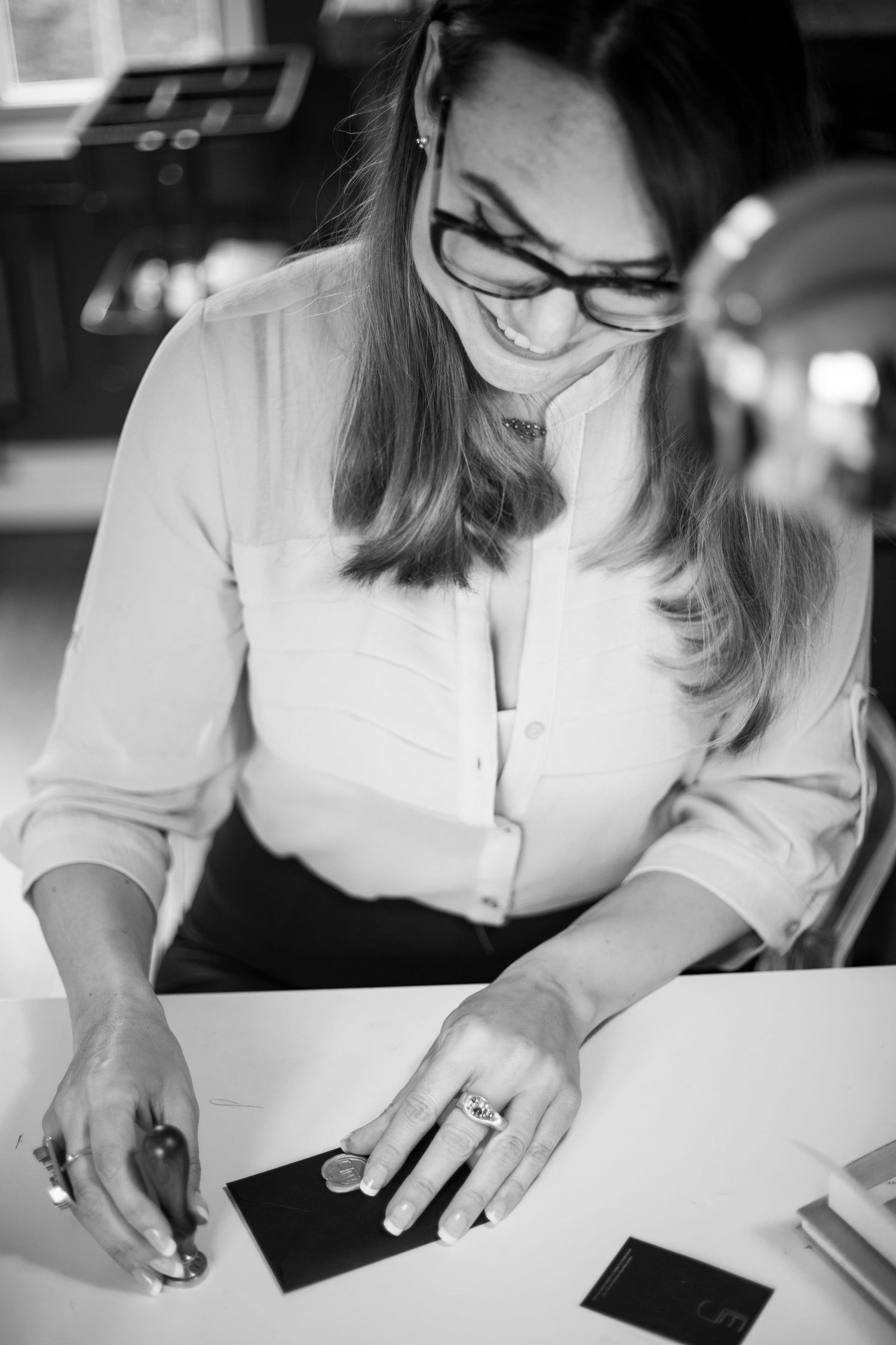 Emily packaging up a unique piece of jewellery for her clients